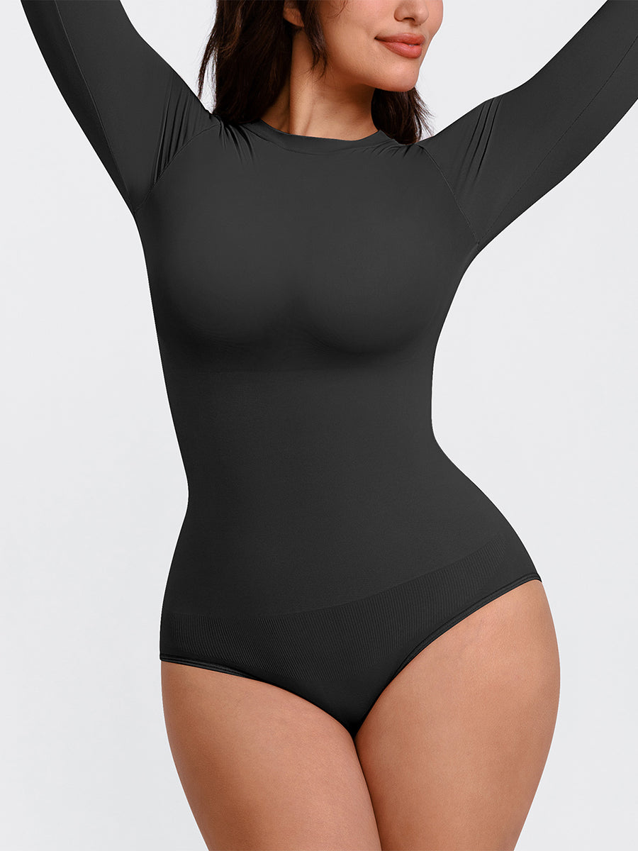 Essentials Classic Long Sleeve Bodysuit in black – model posing with arms raised