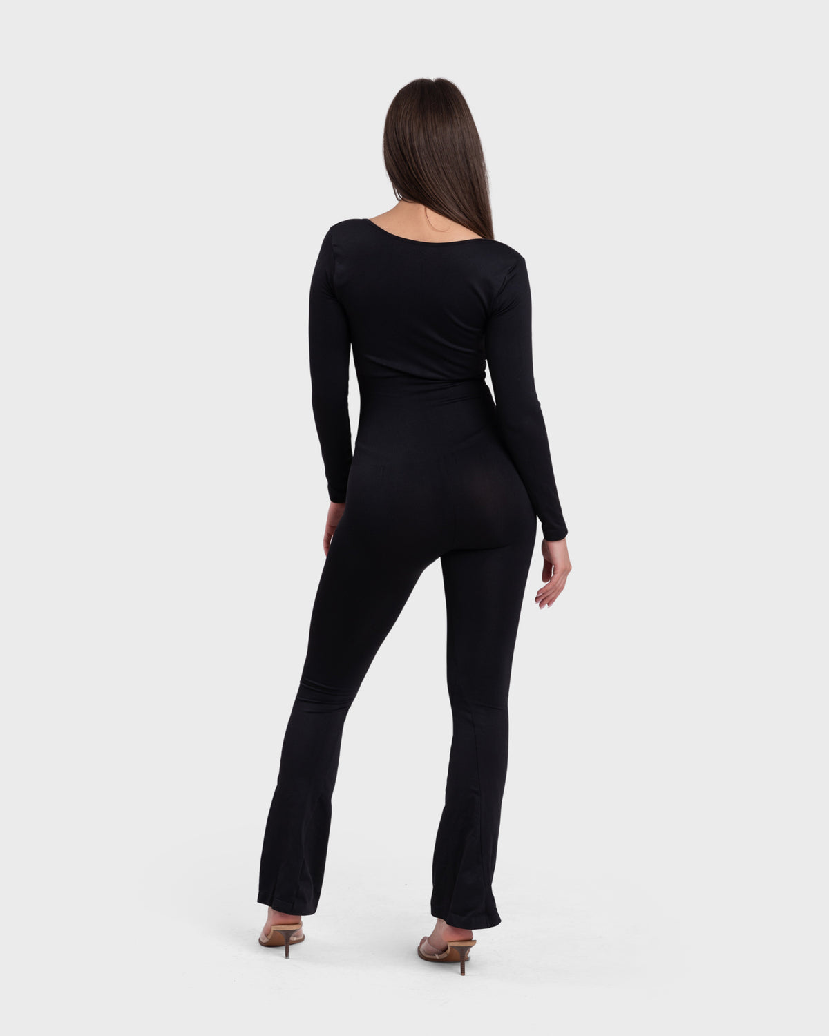 All Day Long Sleeve Flare Jumpsuit in black – full-length back view