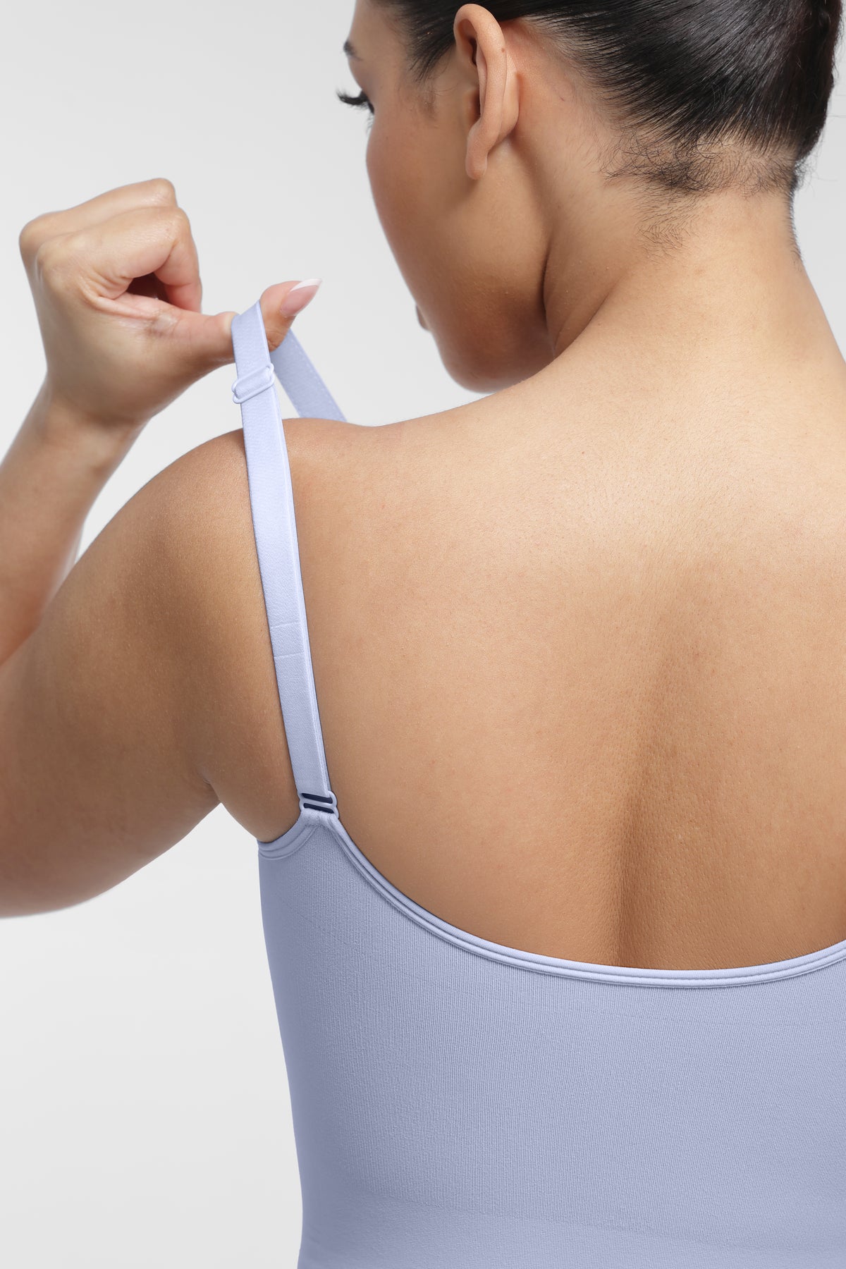 SculptEase Shaping Bodysuit in light blue – close-up of the adjustable shoulder strap