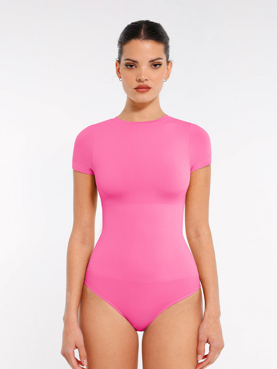 Short Sleeve Crew Neck Bodysuit in pink – front view