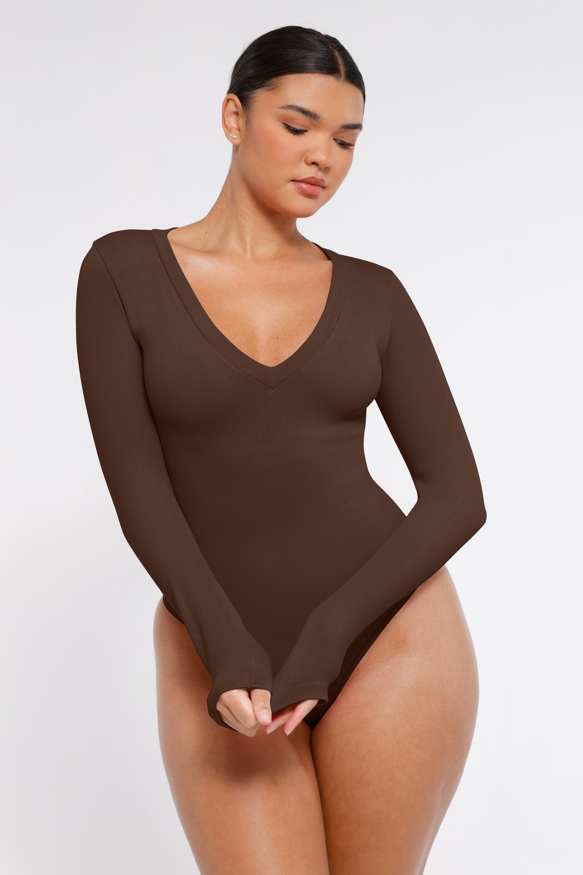 Long Sleeve Ribbed V Neck Bodysuit in brown – alternate front view