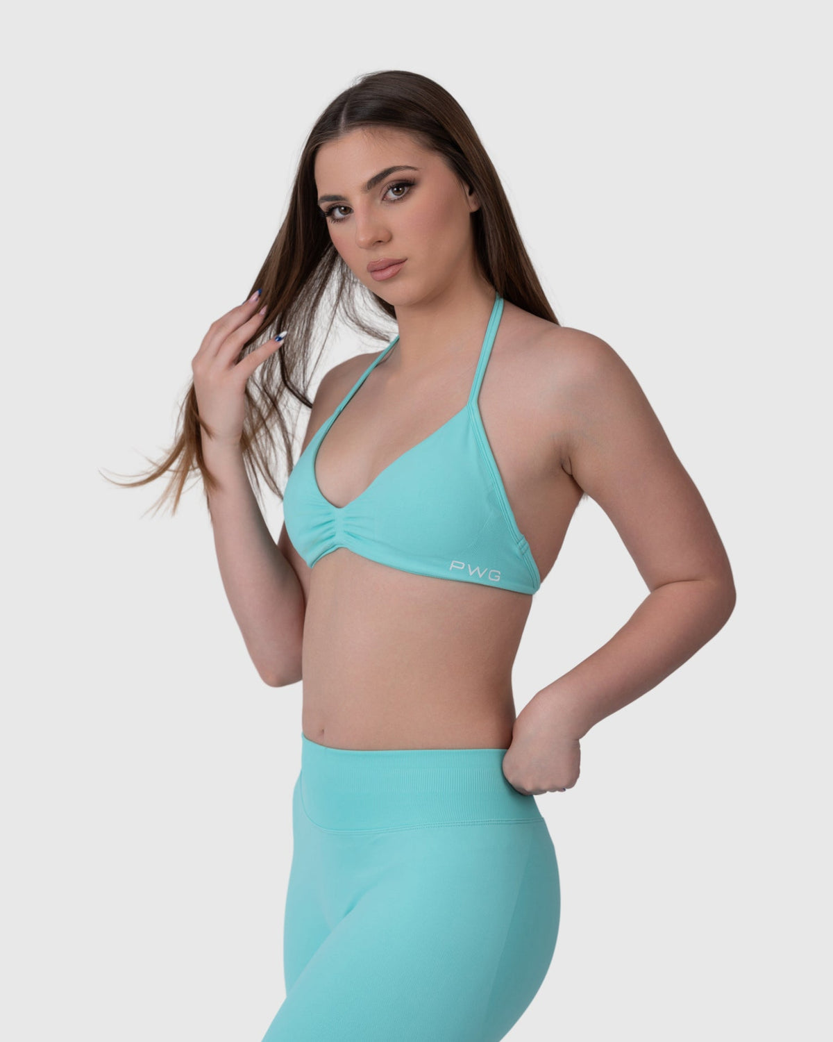 Shop Lily Form Backless Bra in aqua, halter-neck backless bra top – front view