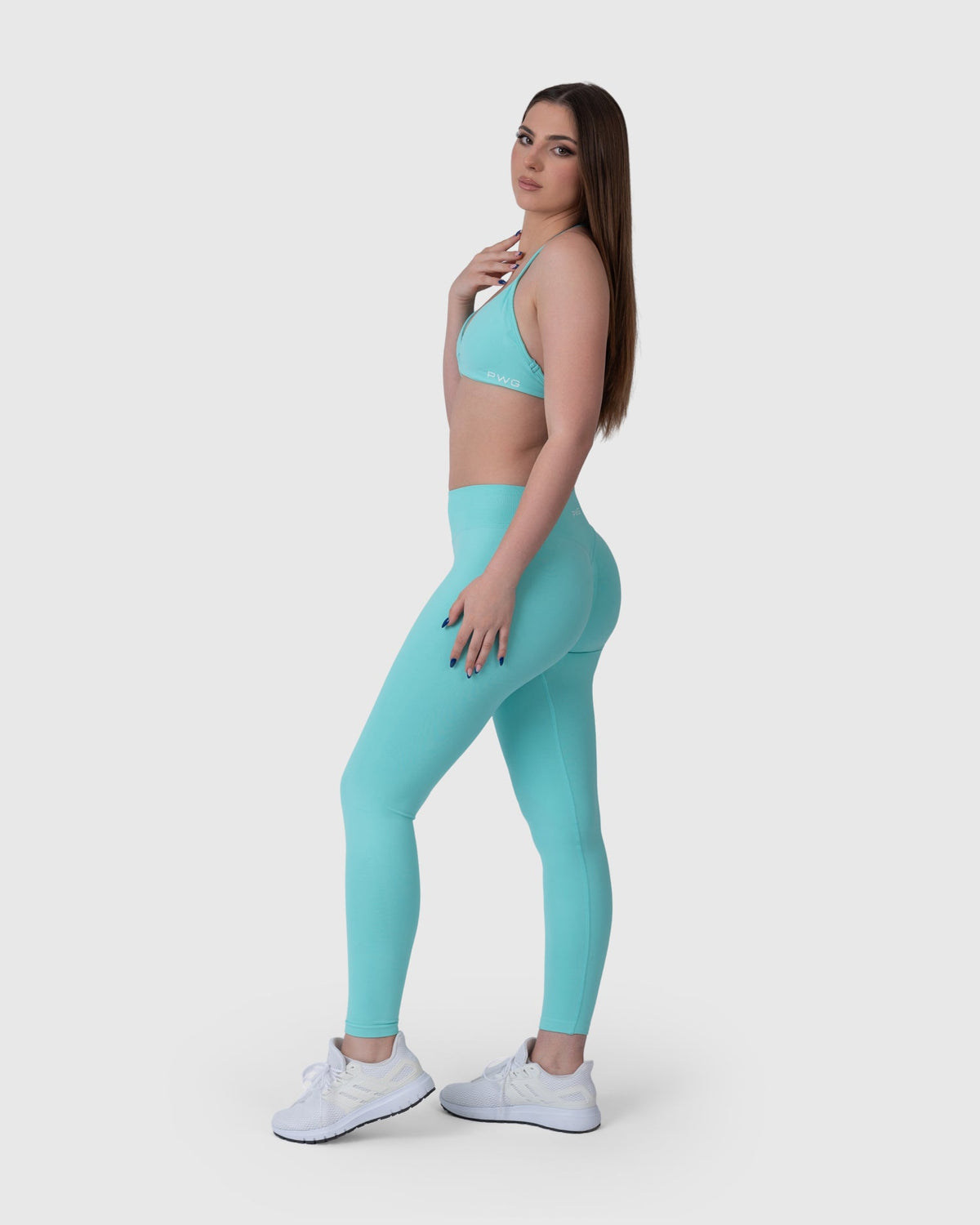 Form Sculpting Leggings in aqua – full-length three-quarter view