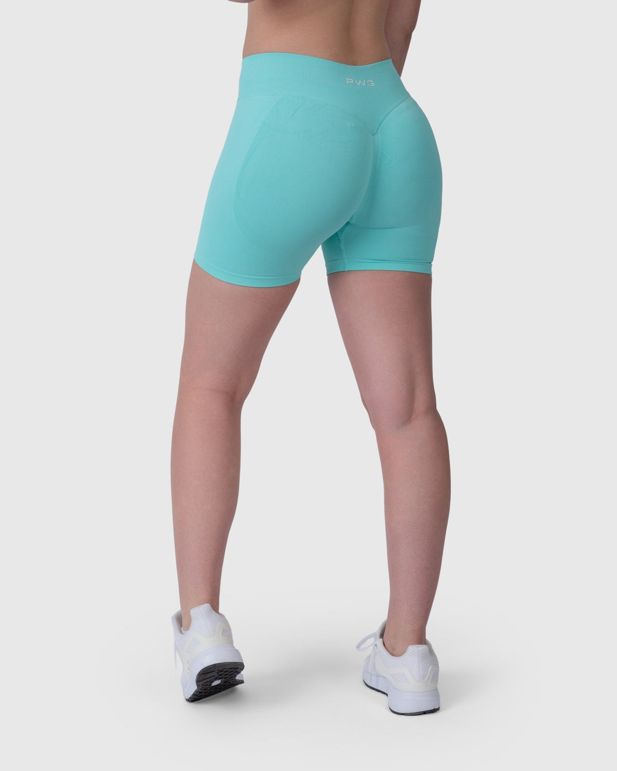 Form Sculpting Shorts in aqua – back view