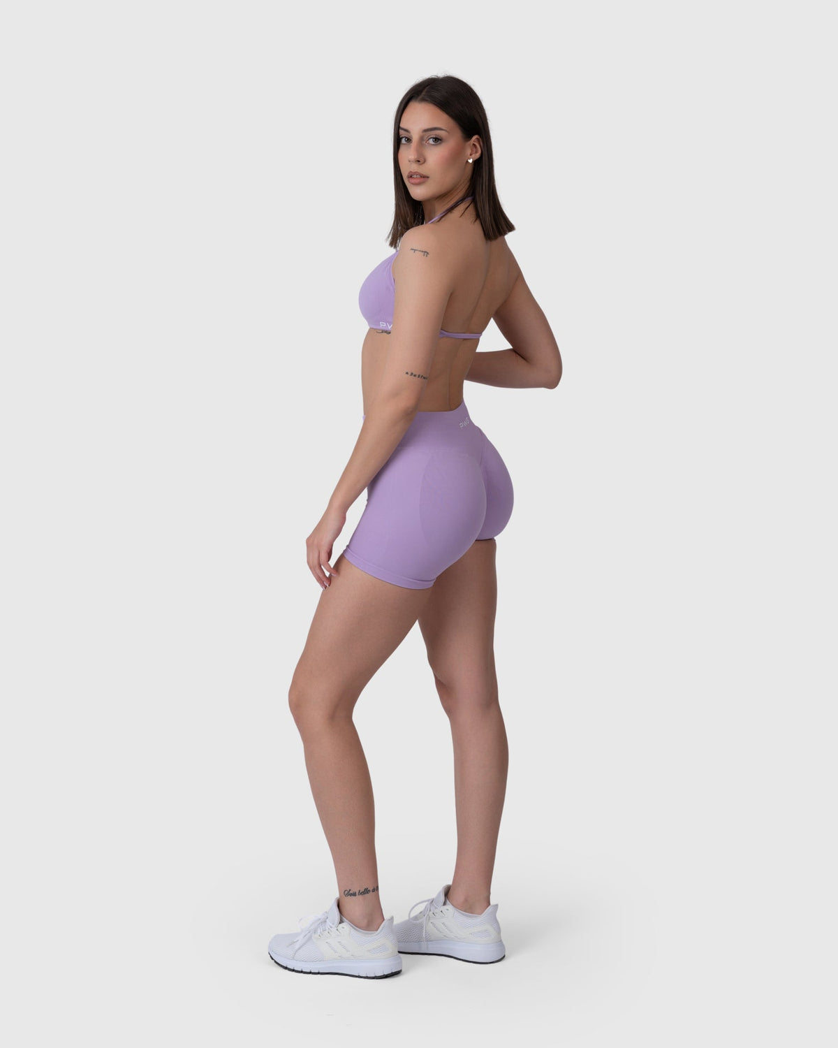 Form Sculpting Shorts in lavender – full-length three-quarter view