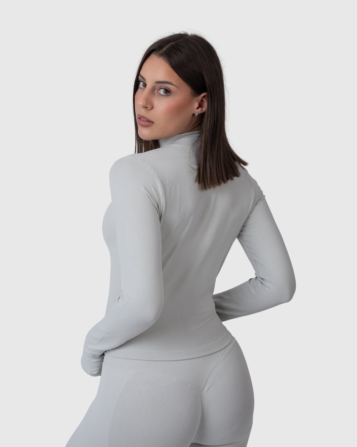 Form Zip Jacket in light grey – back three-quarter view