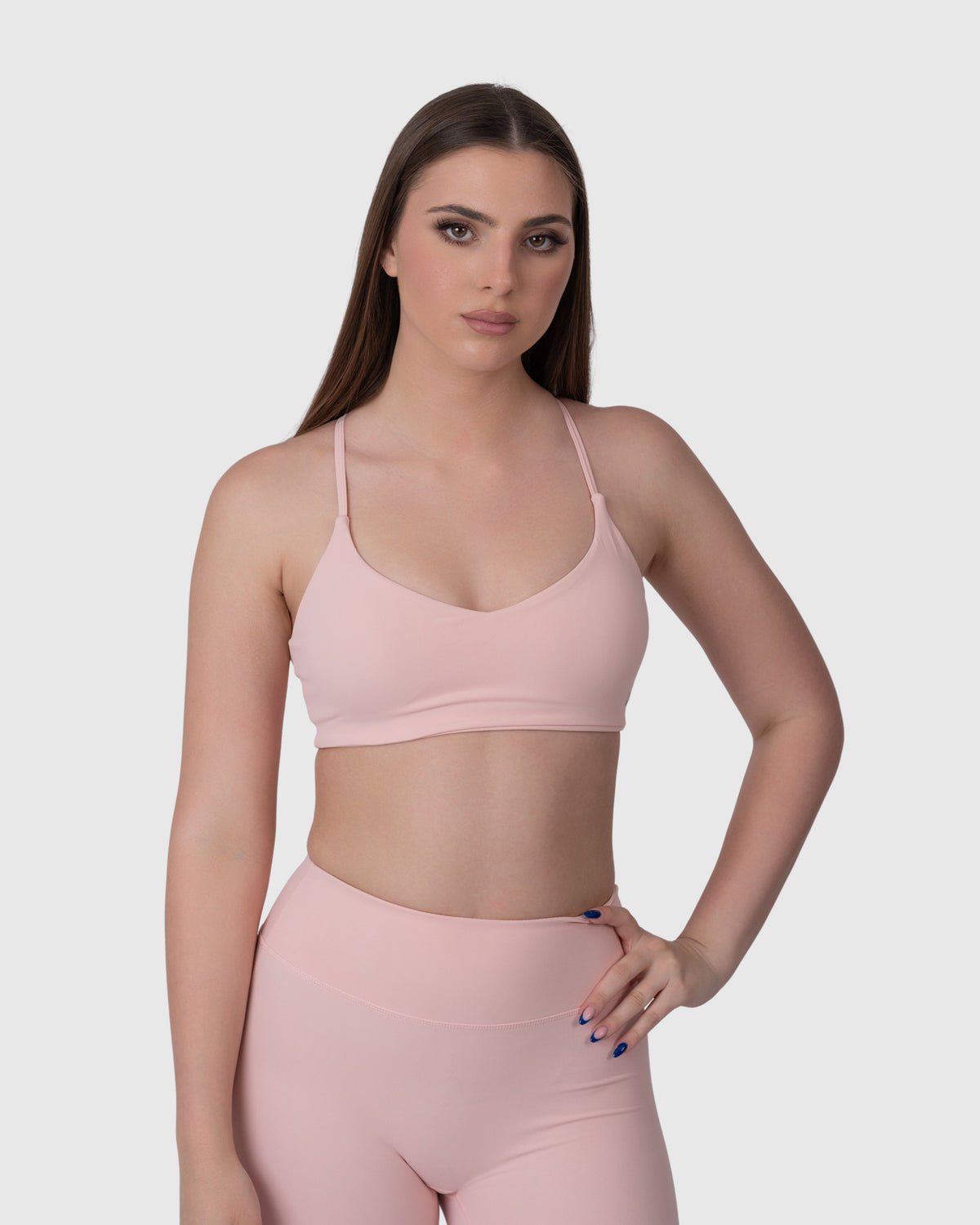 Shop Lily Align Sports Bra in rose, racerback sports bra – front view