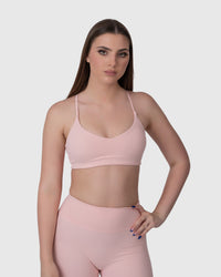 Shop Lily Align Sports Bra in rose, racerback sports bra – front view