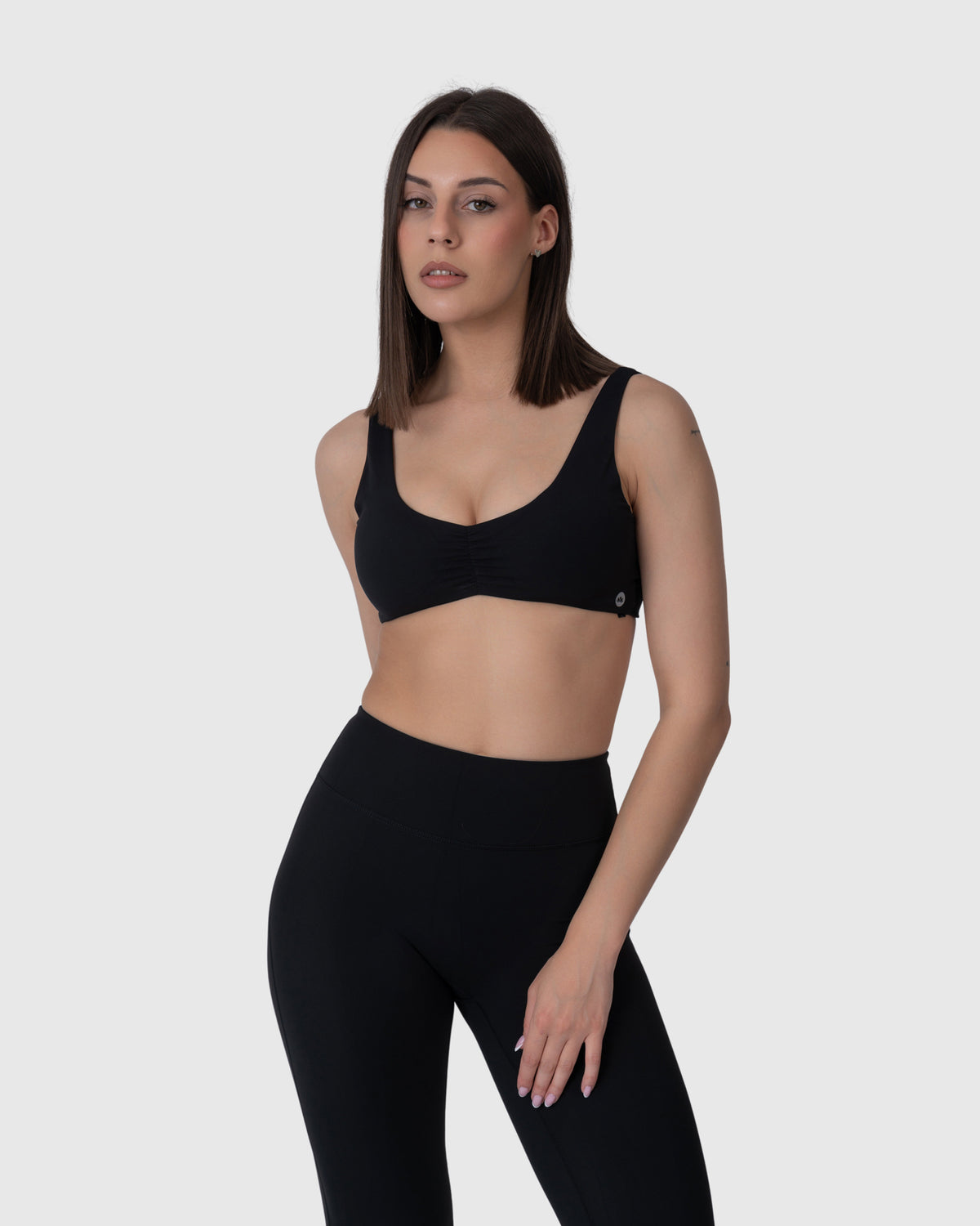 Align Soft Twist Sports Bra in black – alternate front view