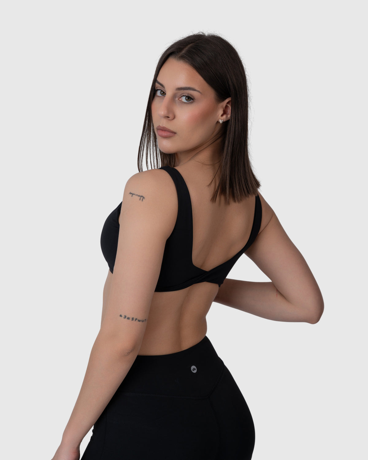 Align Soft Twist Sports Bra in black – back three-quarter view
