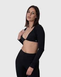 Shop Lily Align Soft Long Sleeve Top in black, cropped long sleeve wrap top – front view