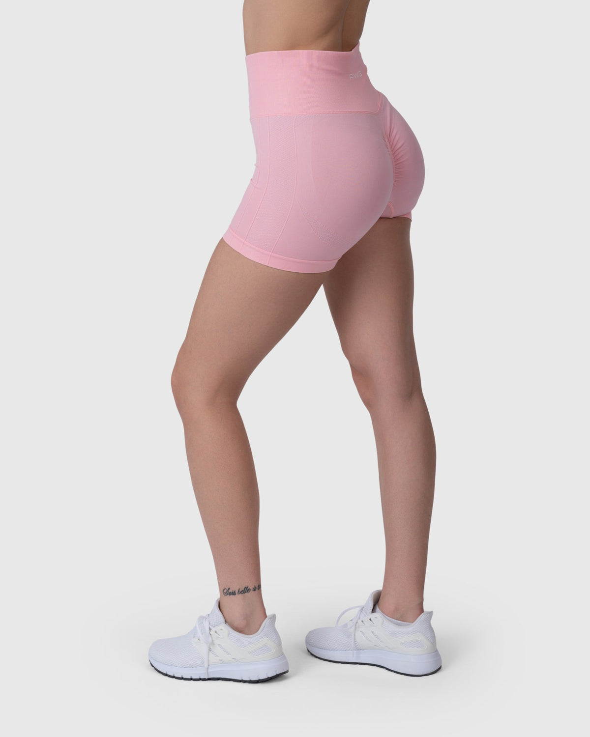Motion Sculpt Shorts in blush pink – back three-quarter view