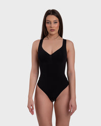 Shop Lily SculptCurve Thong Bodysuit in black, seamless scoop neck sculpting thong bodysuit – front view