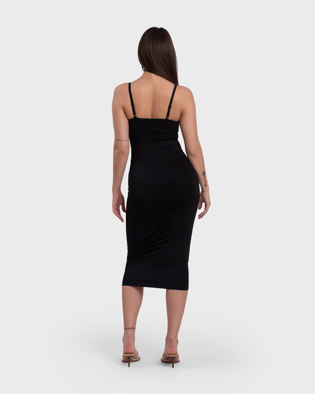 Ultimate Sculpt Midi Dress in black – full-length back view