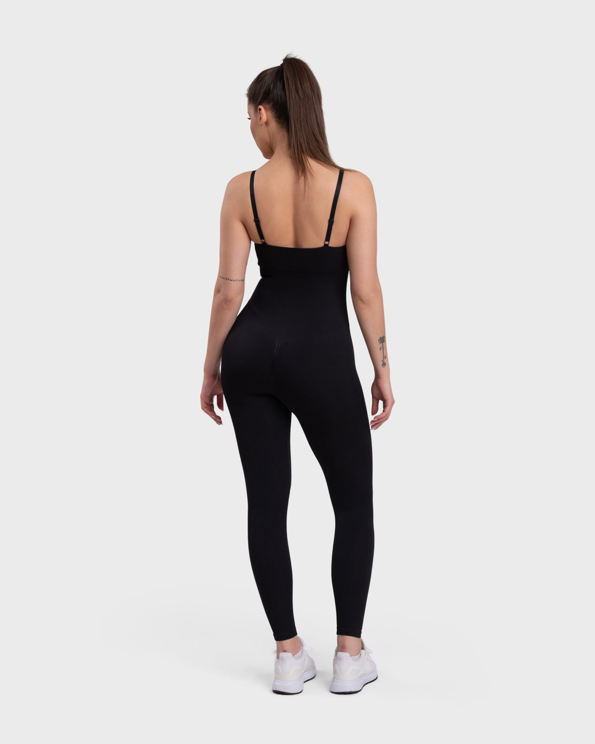 Ribbed Sculpting Jumpsuit in black – full-length back view