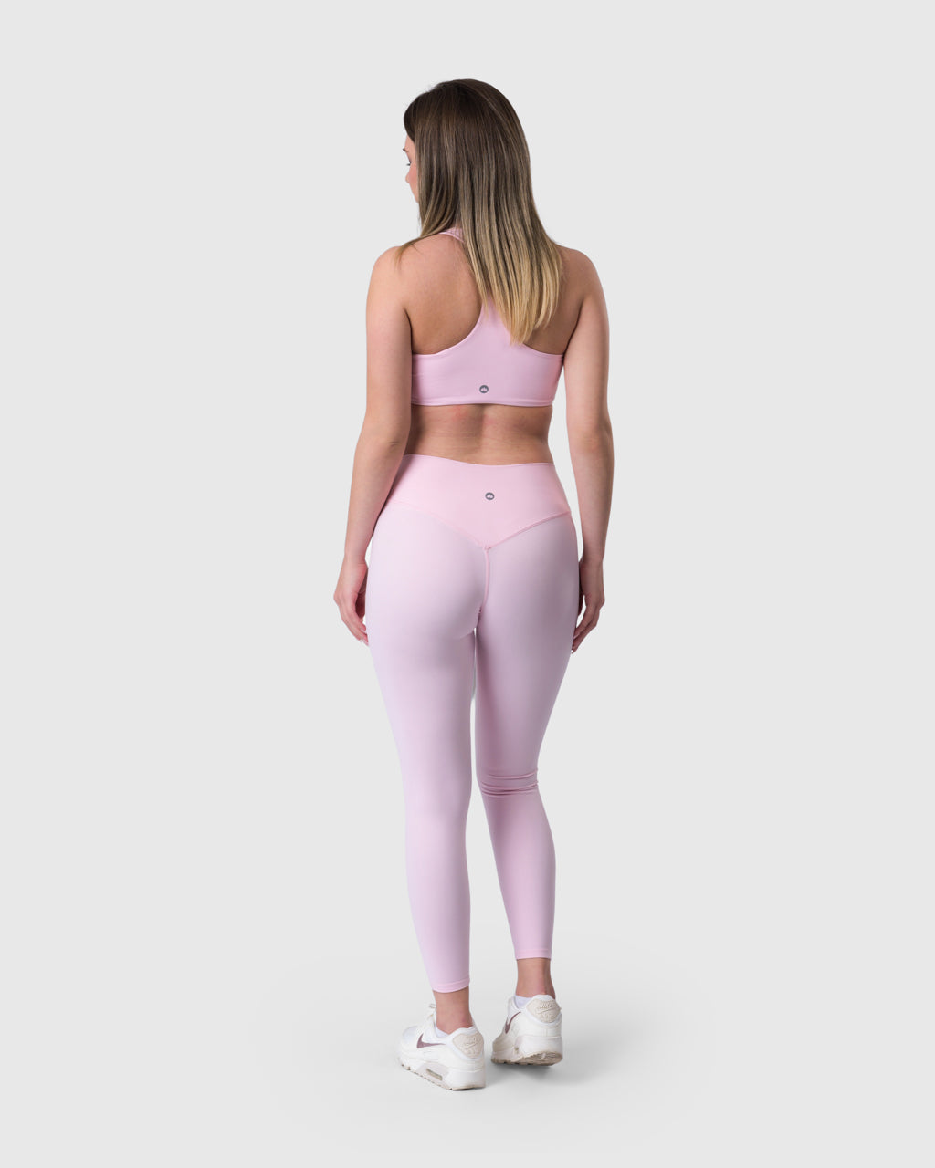 Core Leggings in baby pink – full-length back view