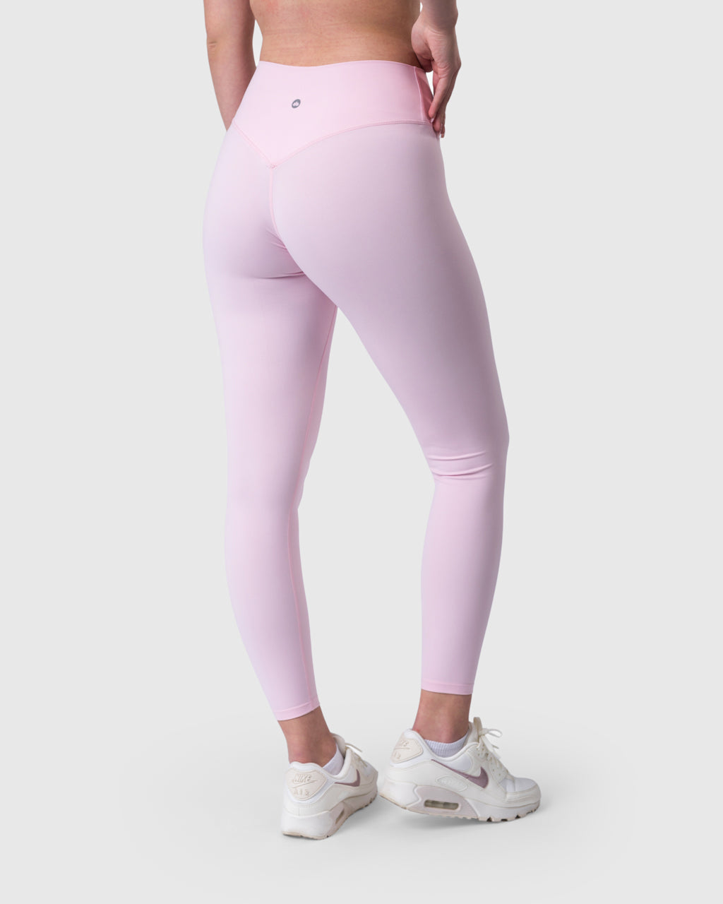 Core Leggings in baby pink – back three-quarter view