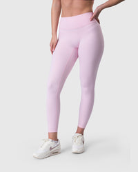 Shop Lily Core Leggings in baby pink, high-waisted seamless leggings – front view