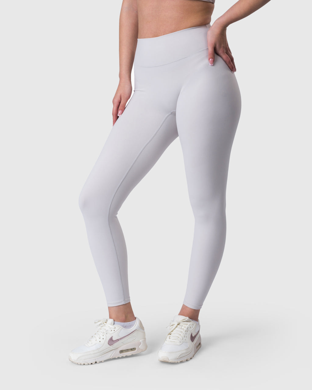 Shop Lily Core Leggings in ivory, high-waisted seamless leggings – front view