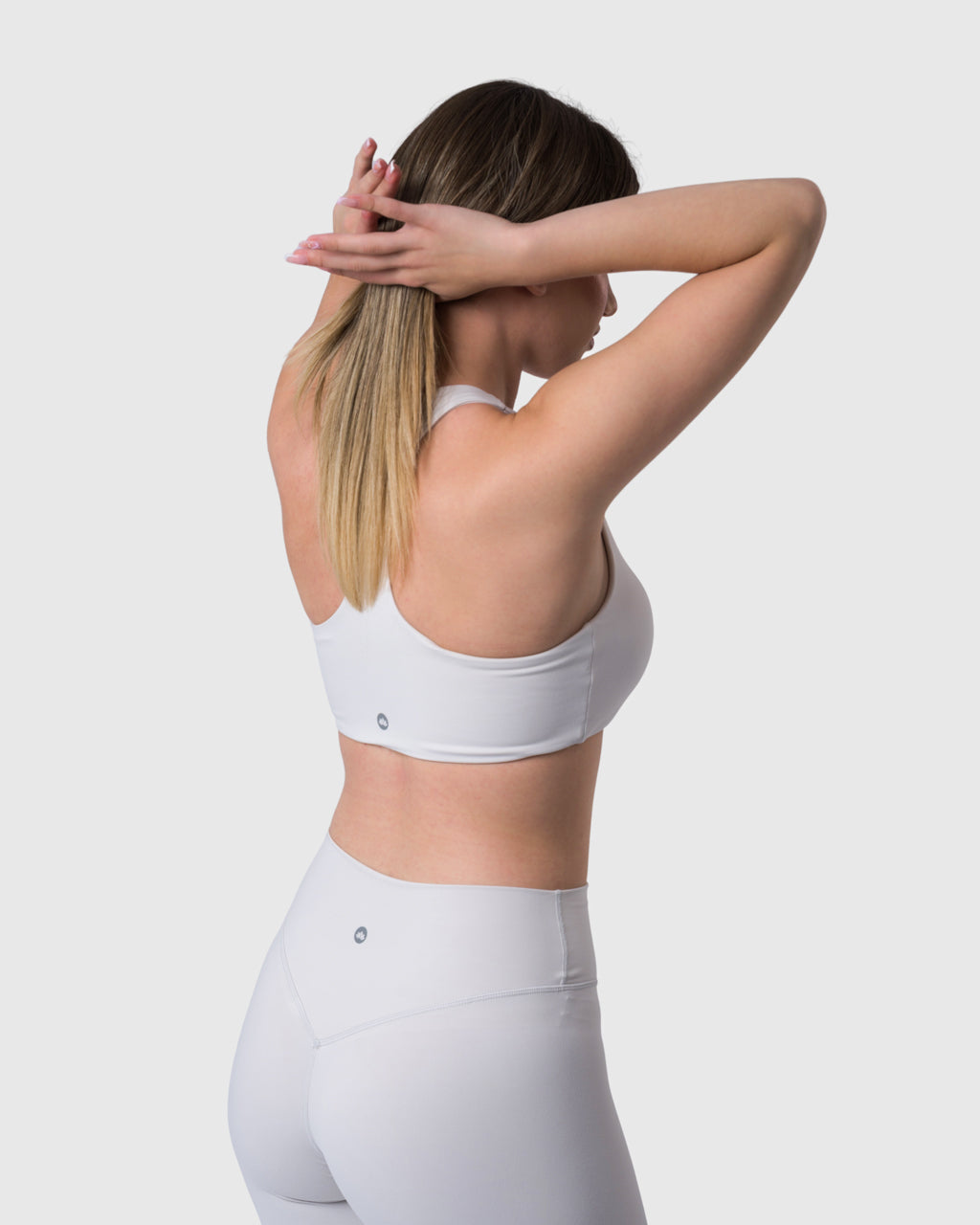 Core Sports Bra in ivory – back three-quarter view