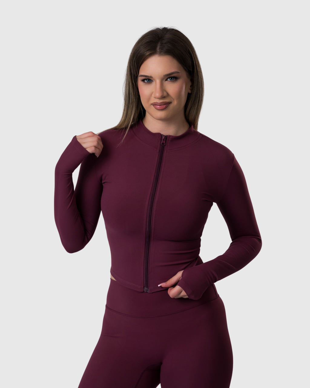 Shop Lily Core Jacket in burgundy, fitted zip-up activewear jacket – front view