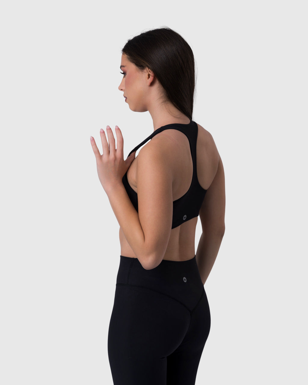 Core Sports Bra in black – back three-quarter view