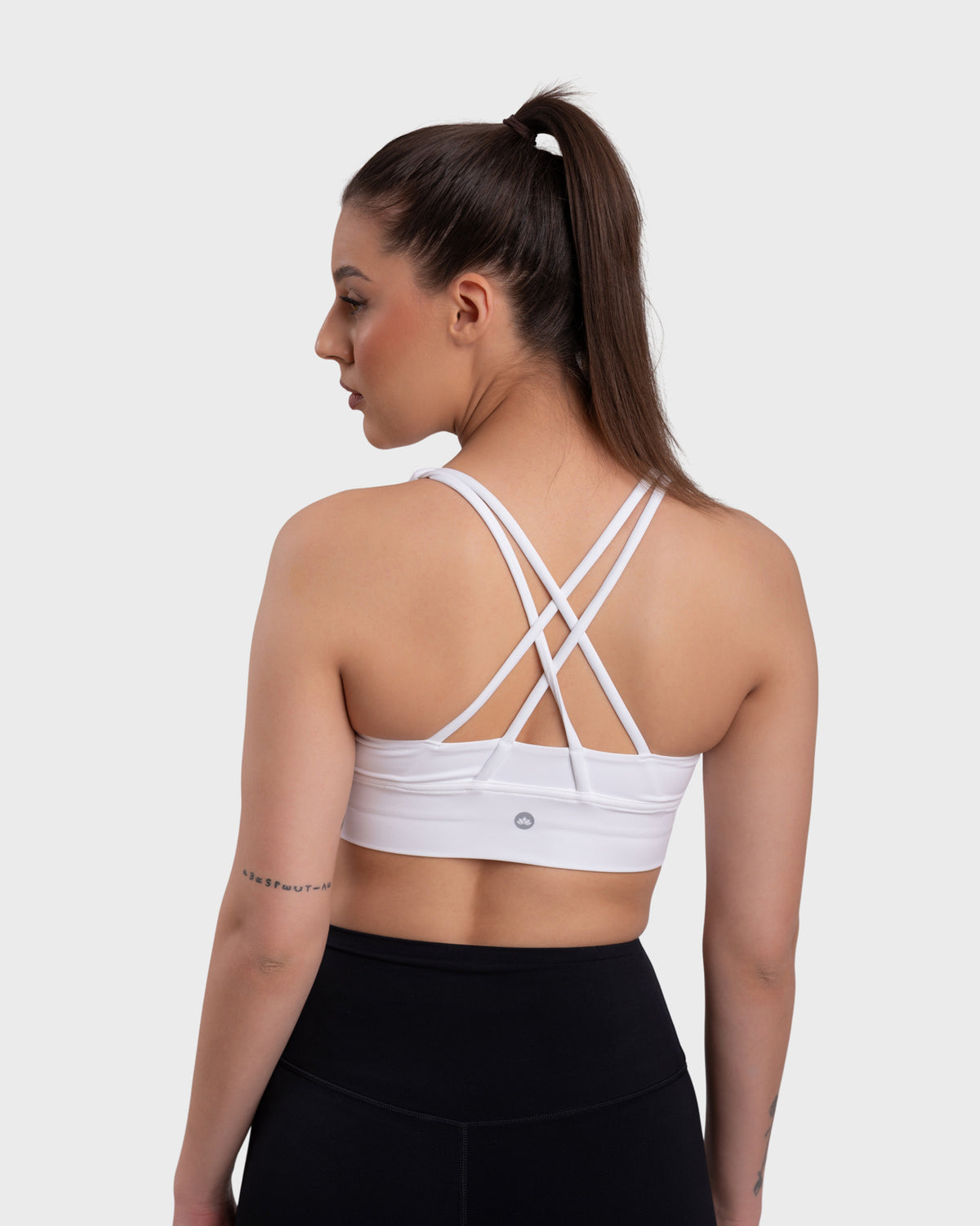 Evolve Active Sports Bra in white – close-up of the crisscross back straps