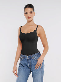 Shop Lily Lace Detail Thong Bodysuit in black, thong bodysuit with scalloped lace neckline – styled with jeans