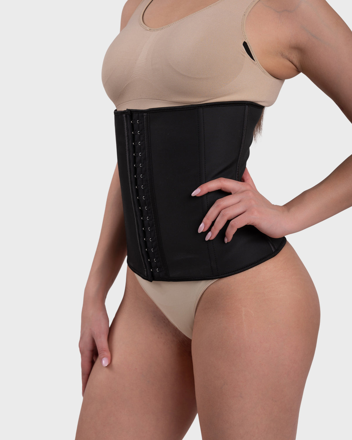 Shop Lily Women's Latex Hourglass Waist Trainer in black, latex hourglass waist trainer – front view