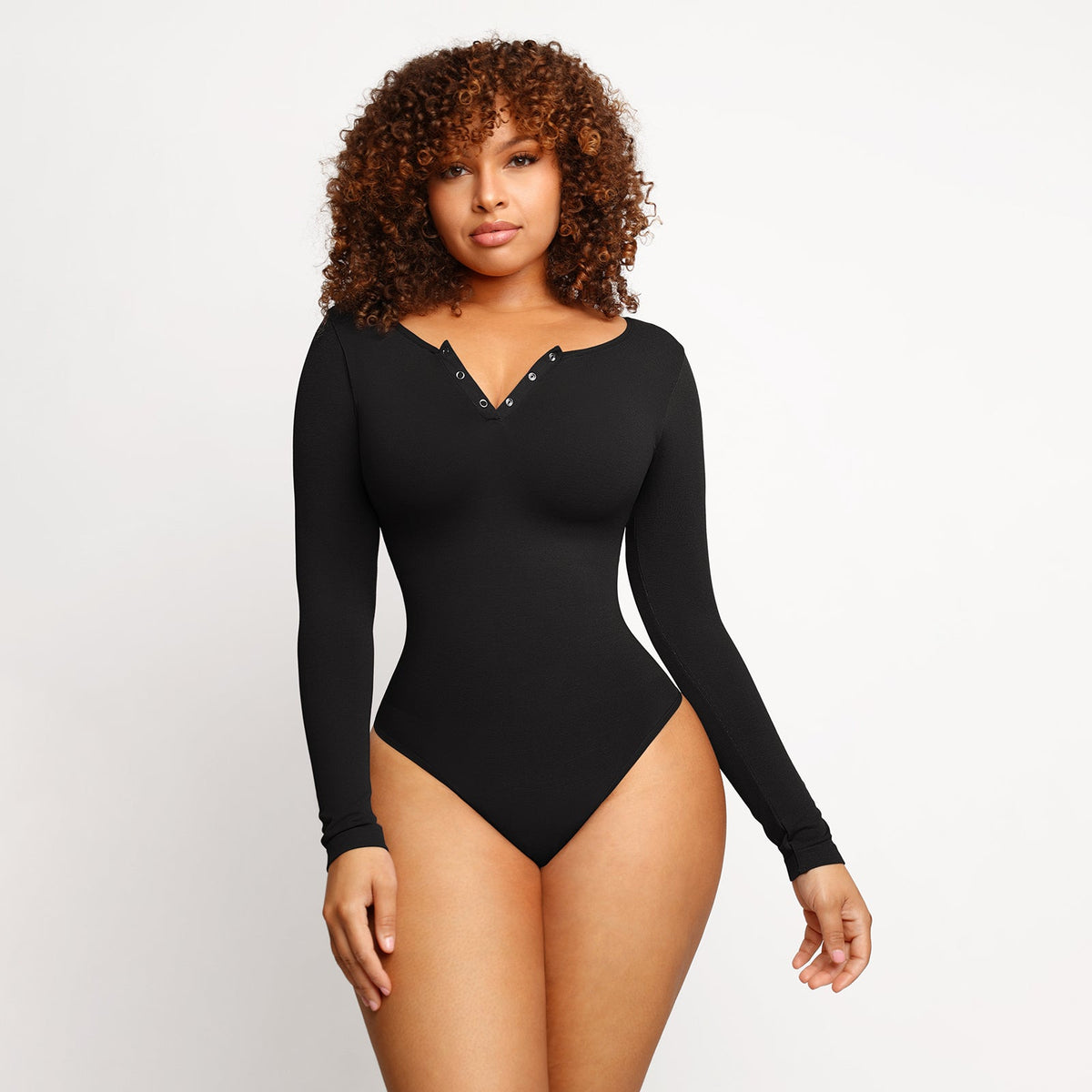Long Sleeve Button Bodysuit in black – alternate front view