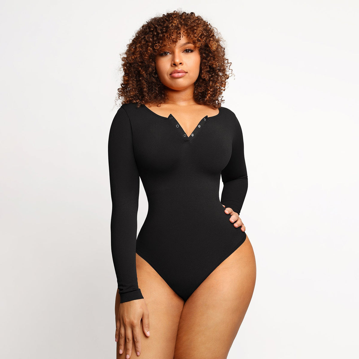 Long Sleeve Button Bodysuit in black – alternate front view