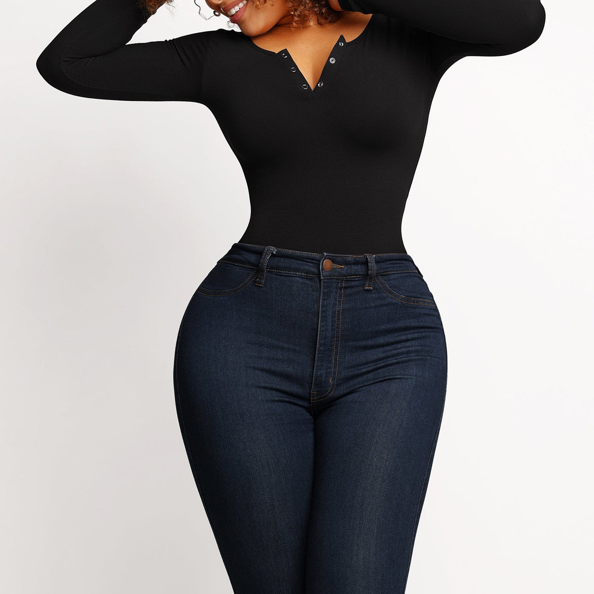 Long Sleeve Button Bodysuit in black – styled with high-waisted jeans