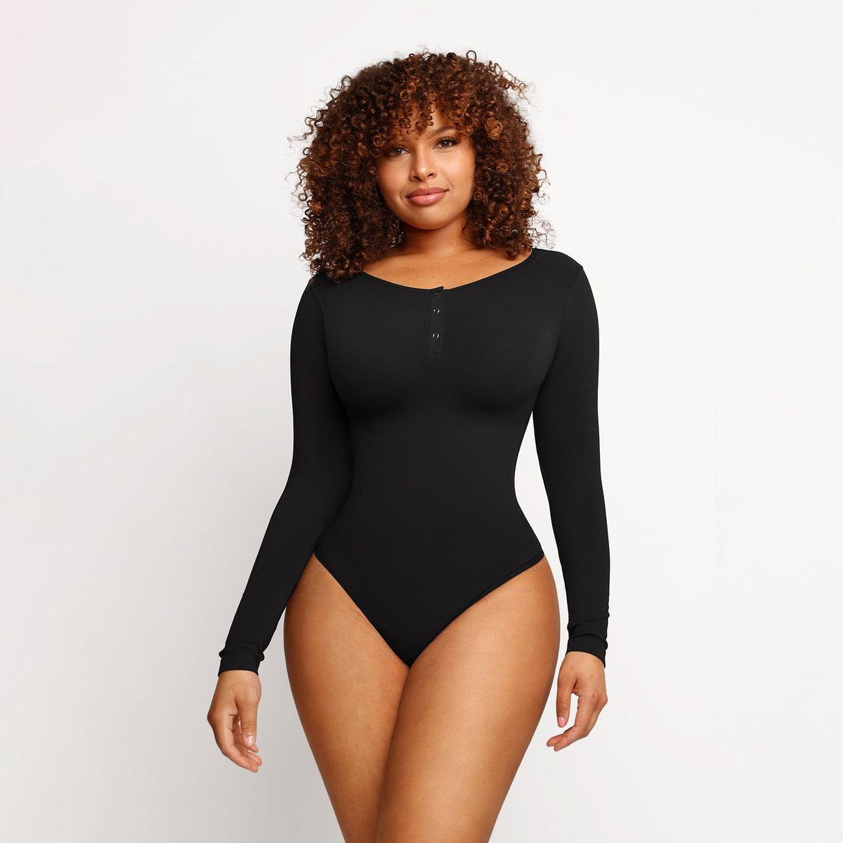 Long Sleeve Button Bodysuit in black – alternate front view