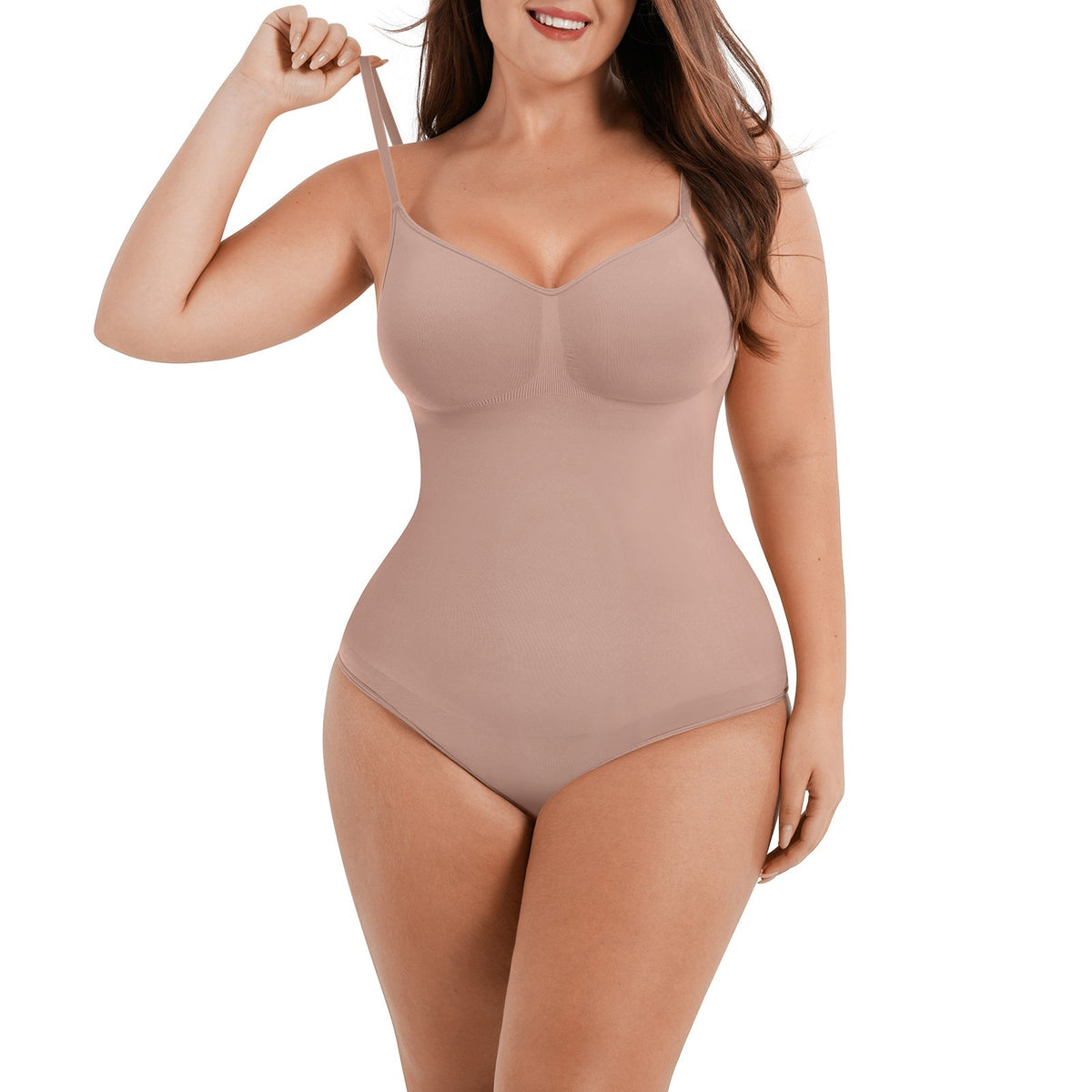 Ultimate Sculpt Thong Bodysuit in nude – model posing with arms raised